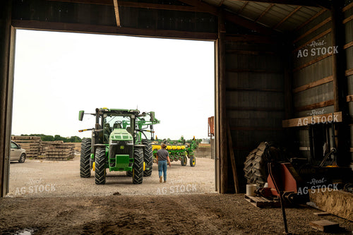 Female Farmer Walking by Planter 115713