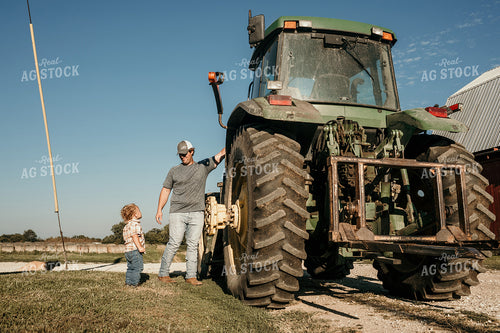 Farmer and Child with Tractor 3150