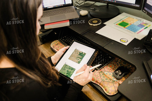 Female Appraiser Working at Computer 9425
