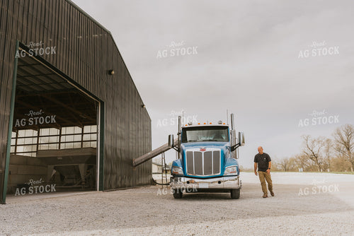 Farmer Walks Away from Truck 7546