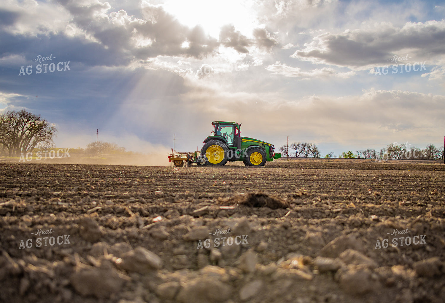 Tractor Rolls Field 56645