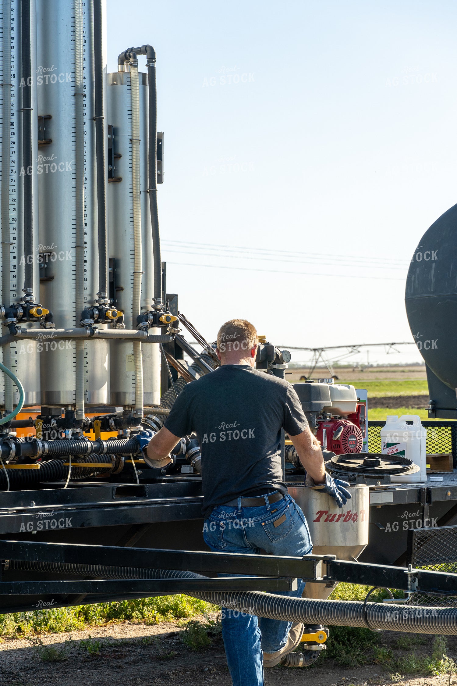 Farmer Mixing Chemicals 65719
