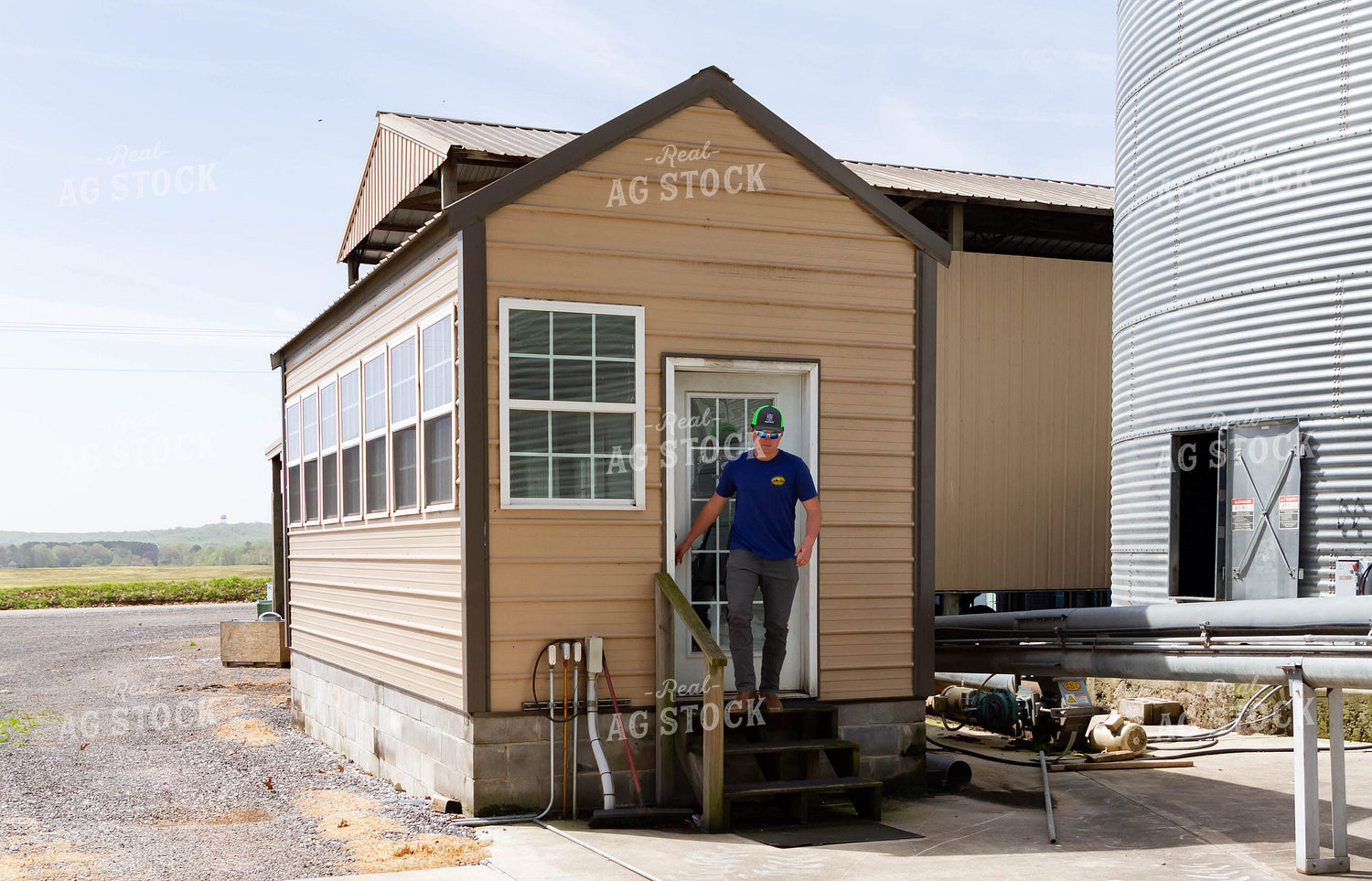 Farmer Exiting Building 79236