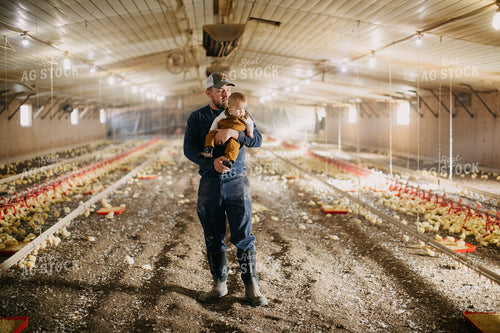 Farmer and Son in Chicken Barn 280022