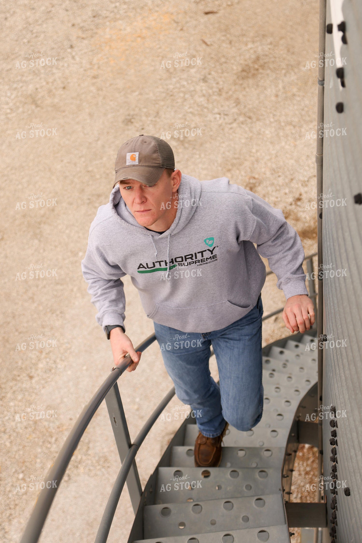 Farmer Climbing Grain Bin 161121