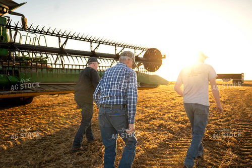 Farmers Walking by Combine 115593