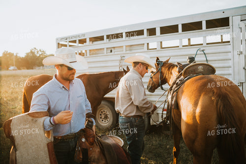 Ranchers and Horses Near Livestock Trailer 6422
