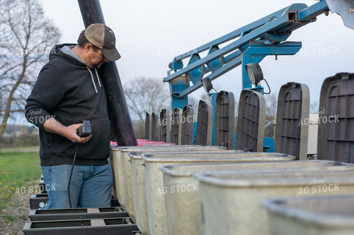 Farmer Loading Planter 50421