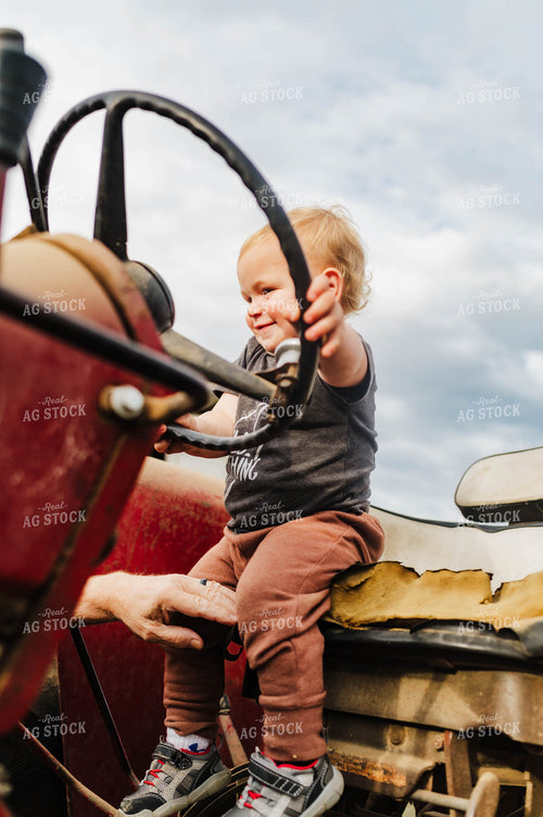 Farm Kid on Tractor 115095