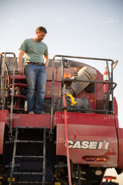 Farmer Fueling Up Combine 286035