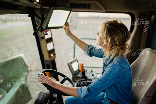 Female Farmer in Combine Cab 8394