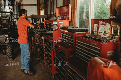 Farmer Getting Tools inside Farm Shop 4511