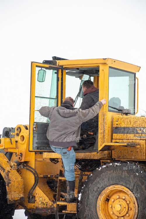 Farmers in Front Loader 155438