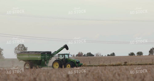 Grain Cart Driving Through Field 3964