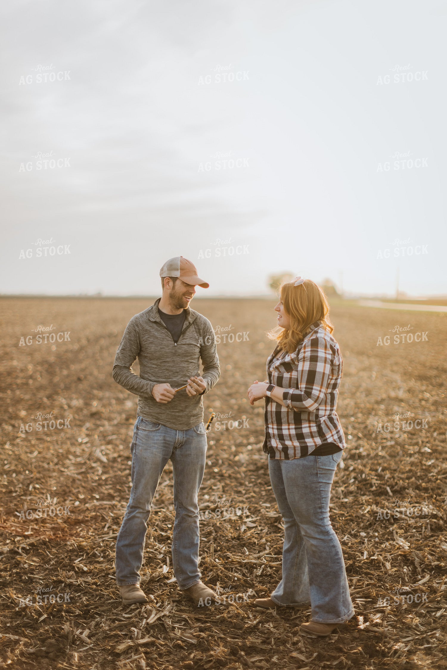 Farm Couple Talking in Field 8229