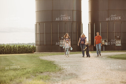 Farm Family Walking Along Corn Field 4477