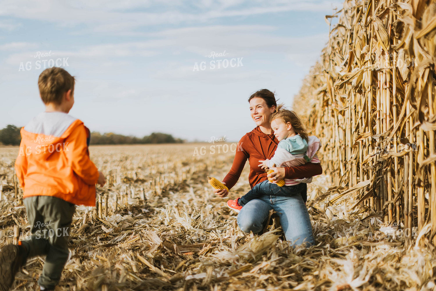Female Farmer and Kids Playing in Cornfield 8520