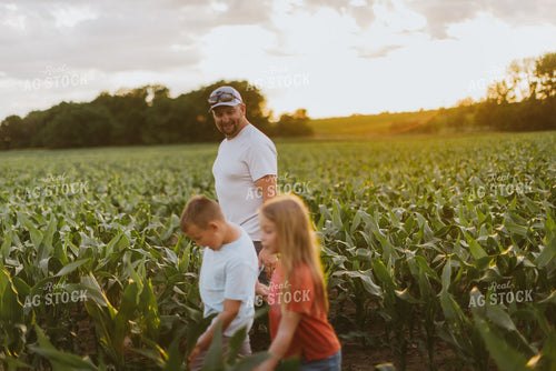 Farmer and Kids Checking Corn 8787