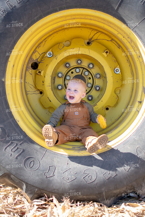 Farm Kid in Tractor Tire 50513