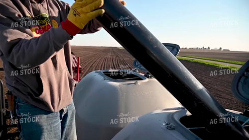 Loading the Planter with the Seed Tender - 079