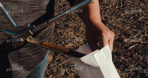Pushing Soil Sample Core from Probe into Sample Bag 3922