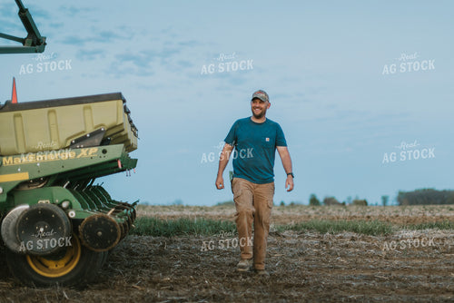 Farmer Walking in Field 7473
