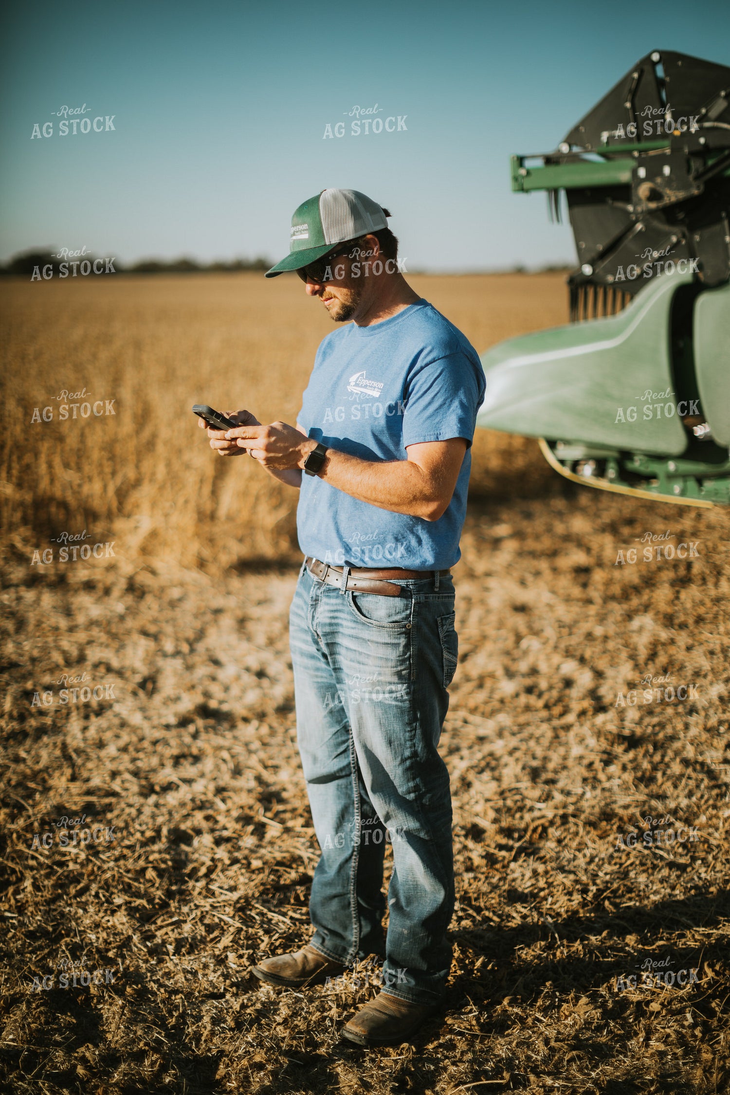 Farmer on Phone in Field 7134