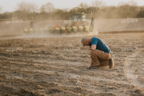 Farmer Touching Soil 7423