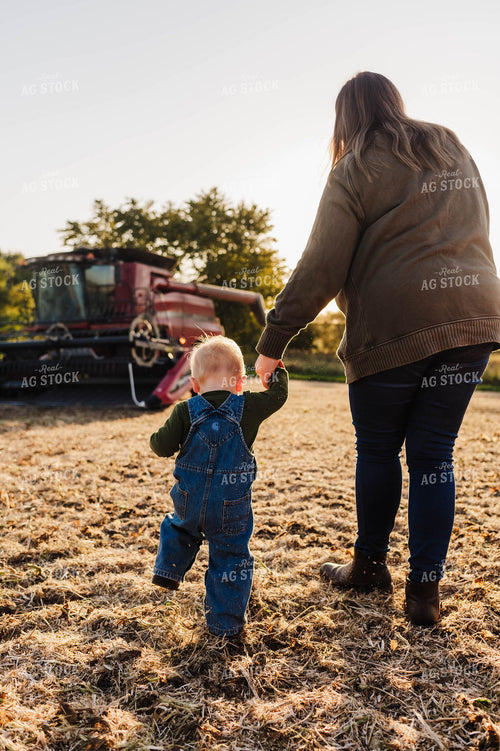 Farm Kid Walking to Combine 115174