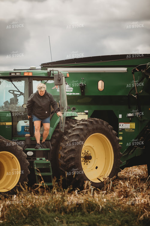 Female Farmer In Auger Wagon 3335