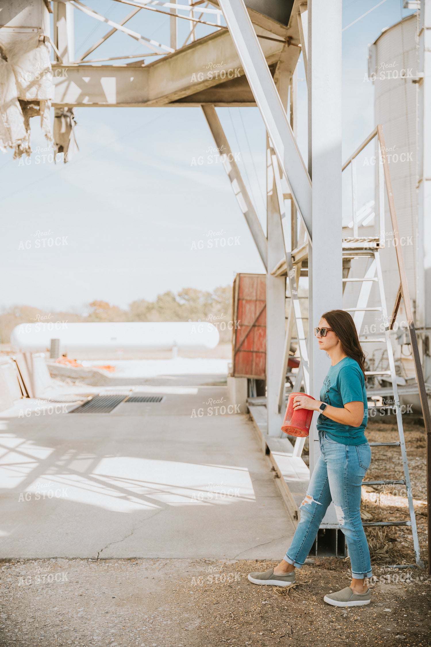 Female Farmer in Farmyard 7028