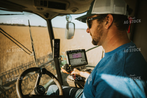 Farmer Operating Combine 7101