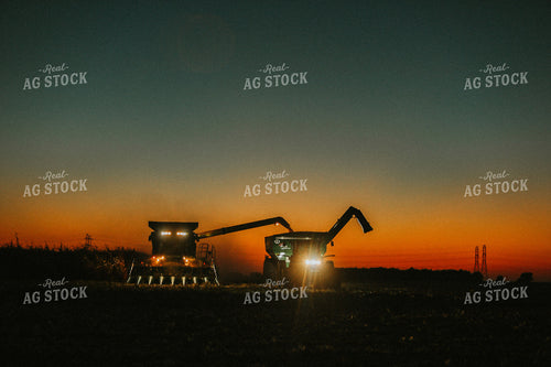 Combine and Auger Cart Harvesting Corn Field 5255