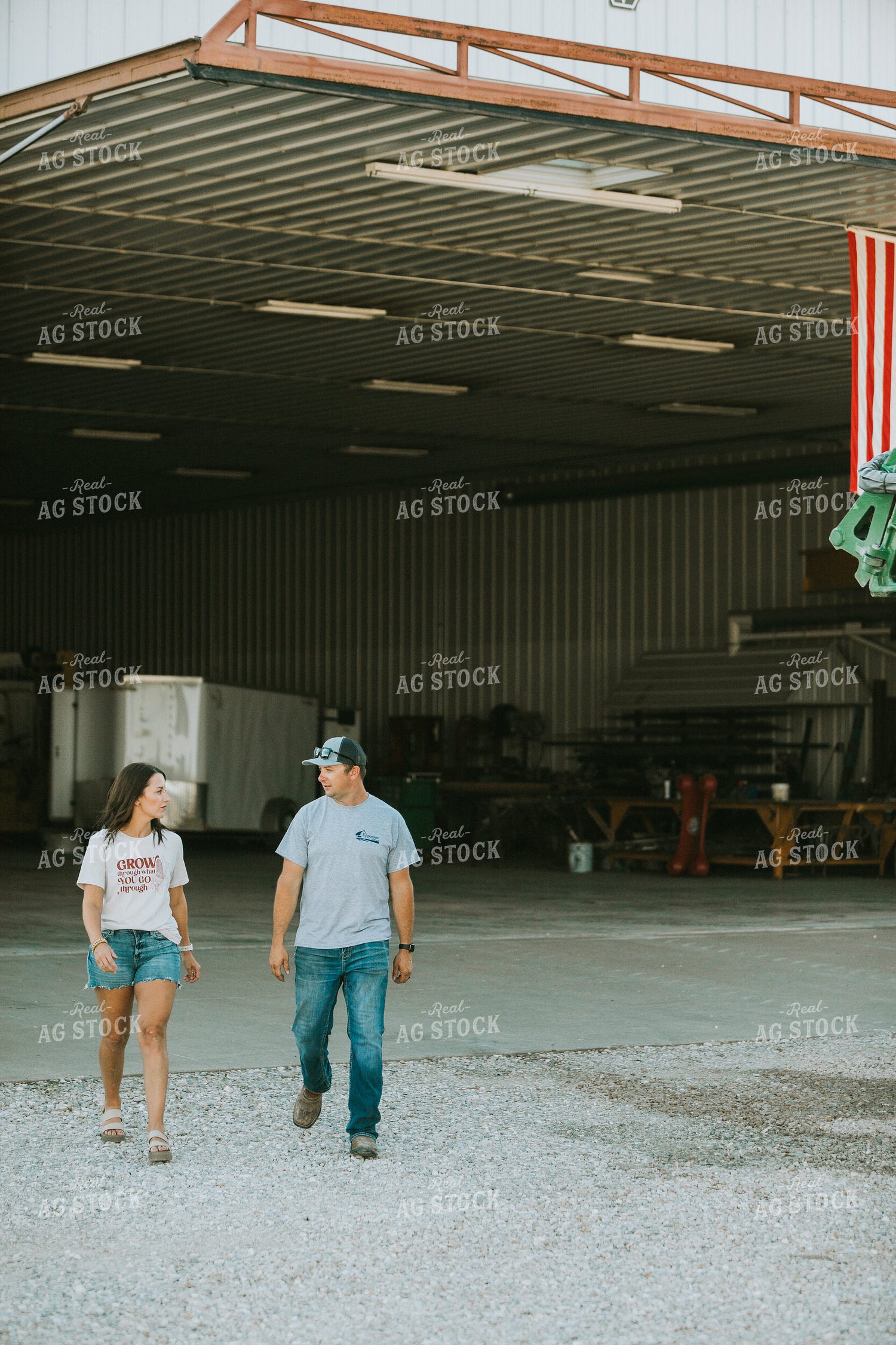 Farmer and Farm Wife Talking Outside Shop 6241