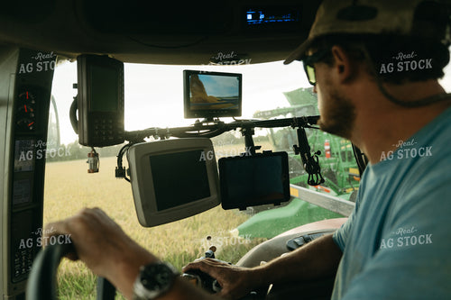 Farmer Driving Tractor in Rice Field 125275