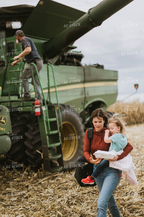 Female Farmer with Daughter Delivering Field Meal 8568