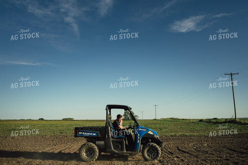 Farmer with Daughter in UTV 4232