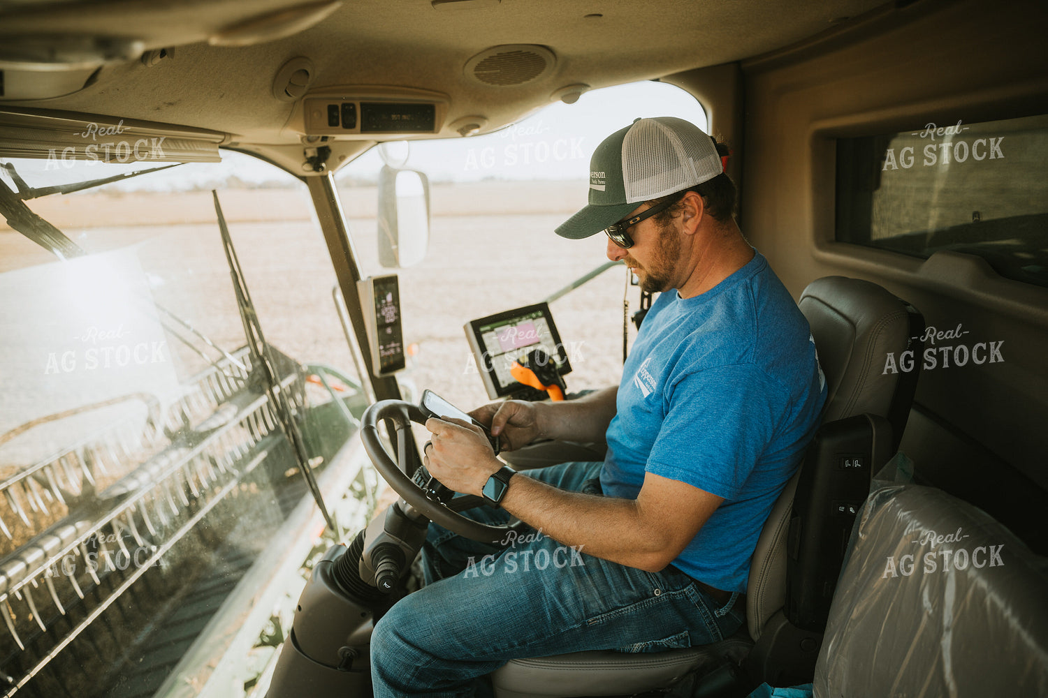 Farmer Inside of Combine on Phone 7206