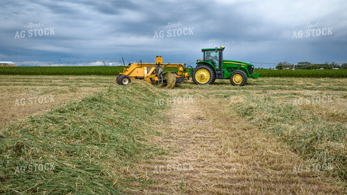 Tractor with Merger in Hay Field 56411