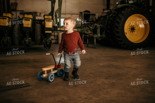 Farm Kid in Shop at Planting 4301