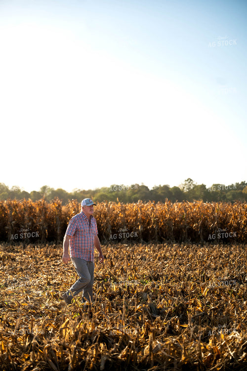Farmer Walking in Field 115544