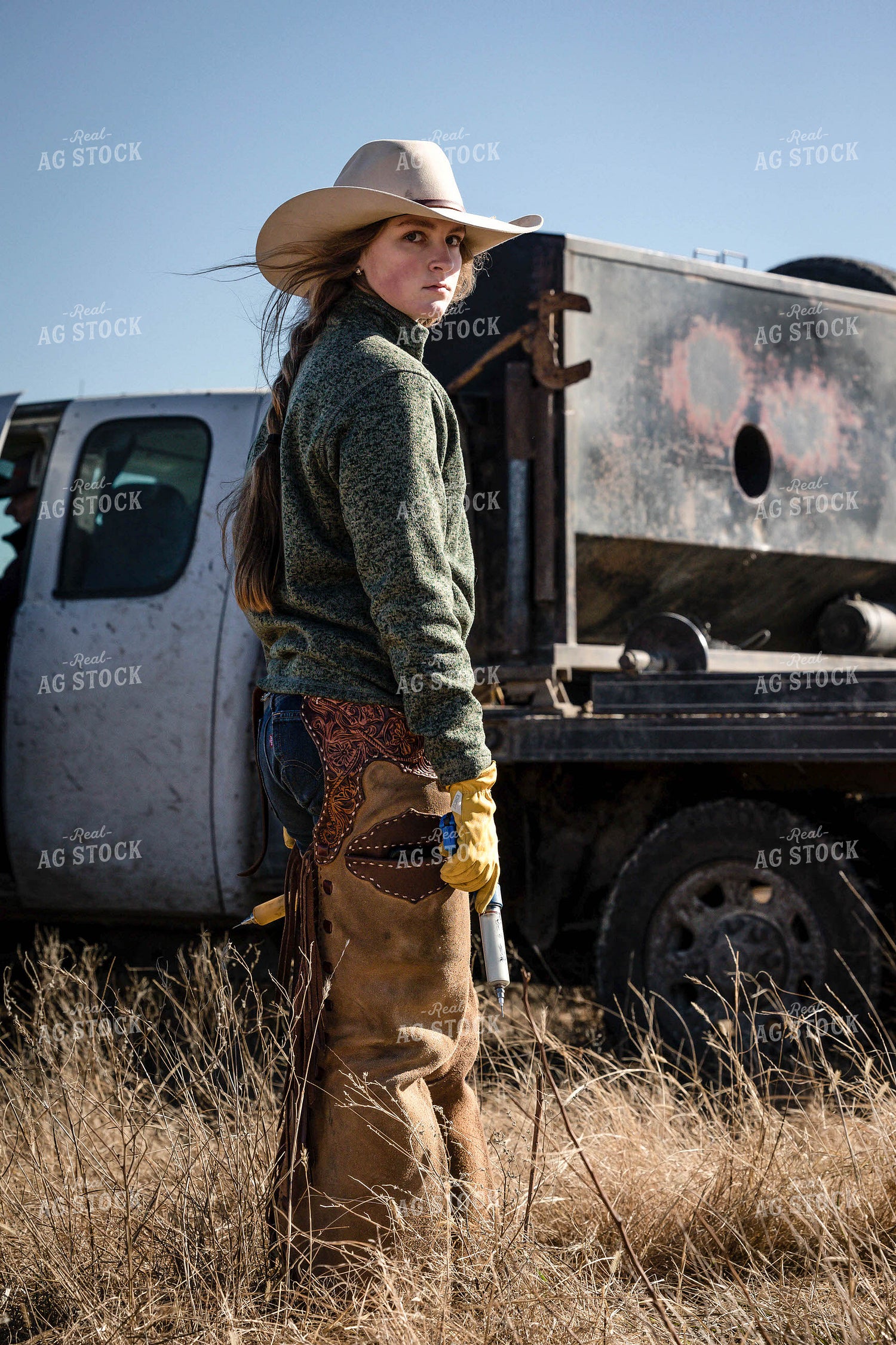 Female Rancher Vaccinating Cattle 219055