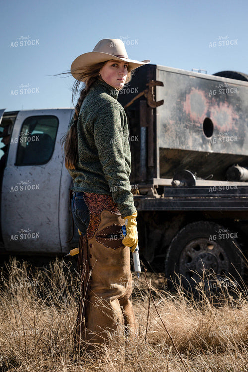 Female Rancher Vaccinating Cattle 219055