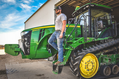Farmer Climbing Out of Tractor 56165