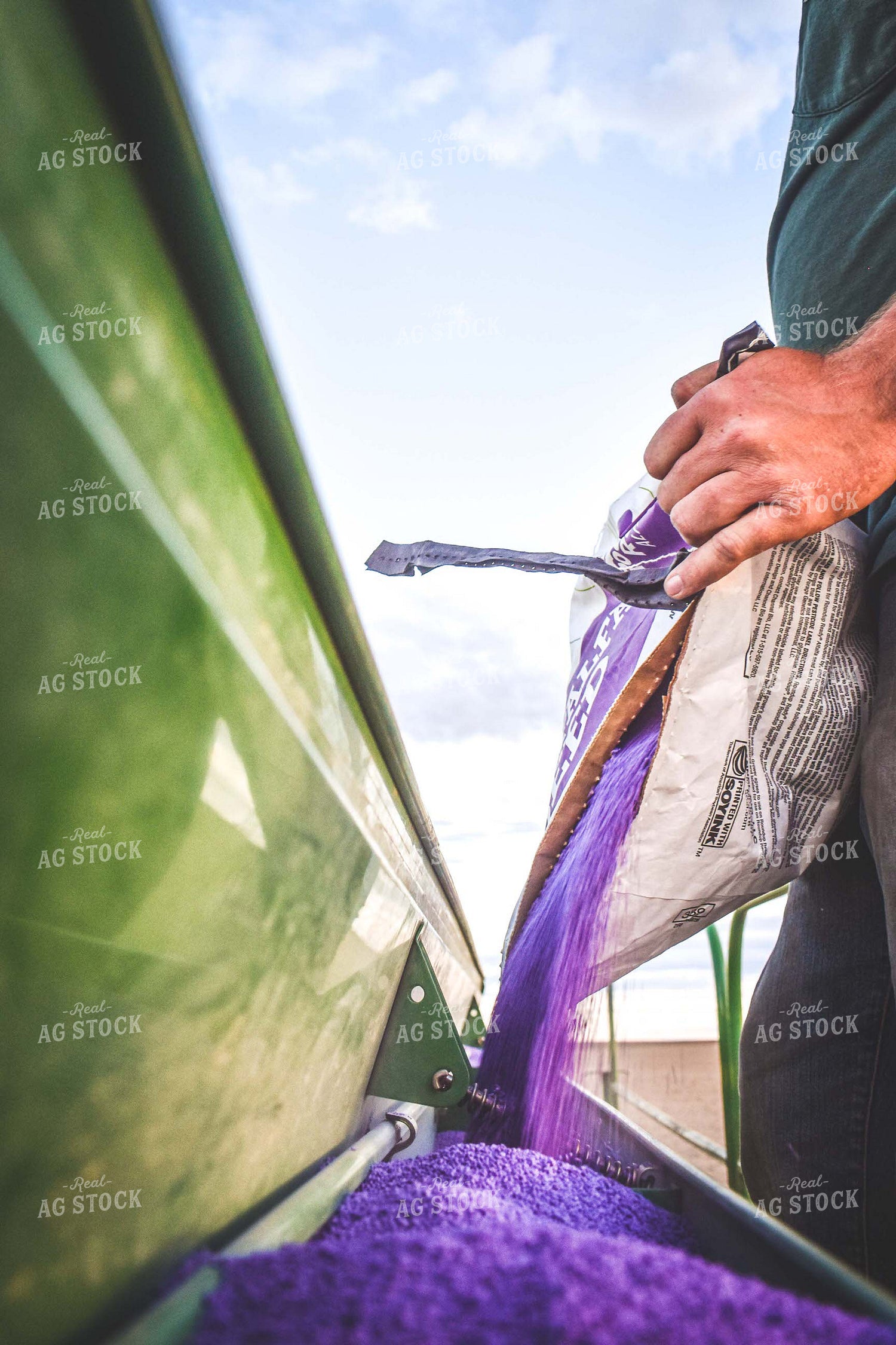 Loading Drill with Alfalfa Seed 56082