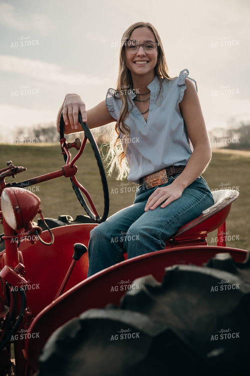 Girl on Antique Tractor 194041