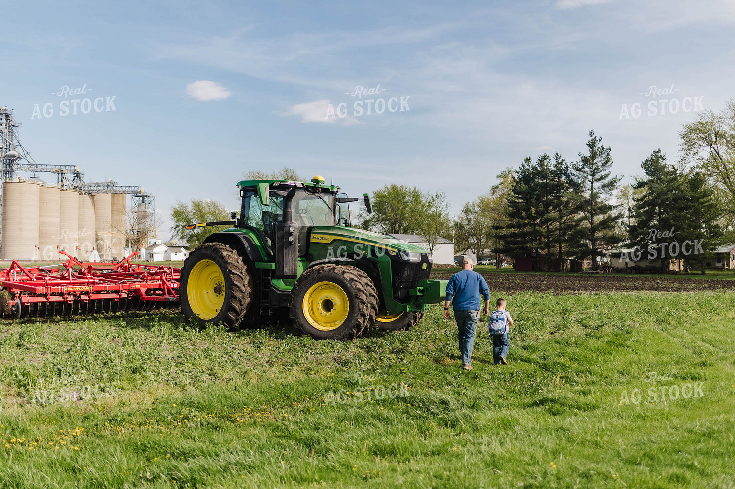 Farm Kid Walking to Tractor with Father 115066