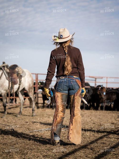 Female Rancher Working Cattle 219011
