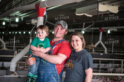 Farm Family in Hog Barn 197014