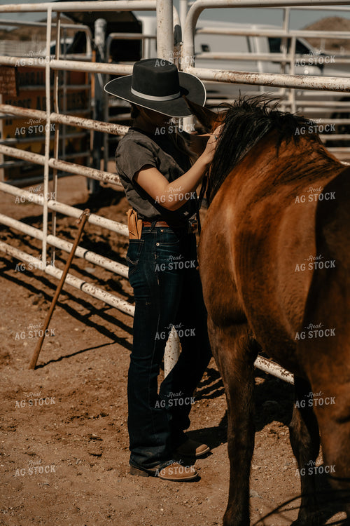 Rancher and Horse in Farmyard 58211
